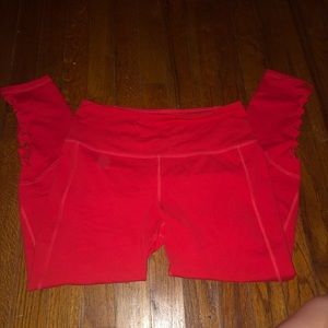 Red leggings worn once! On the bottom sides it has cut out design